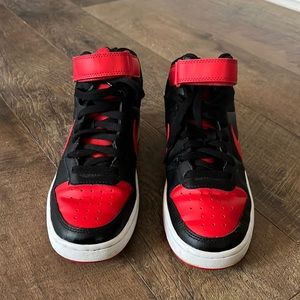 Red and black Nikes youth 7 big kids